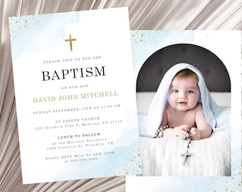 May include: A blue and gold baptism invitation with a photo of a baby boy wearing a white blanket and holding a rosary. The invitation includes the text "Please join us for the Baptism of our son David John Mitchell" and details about the ceremony and reception.