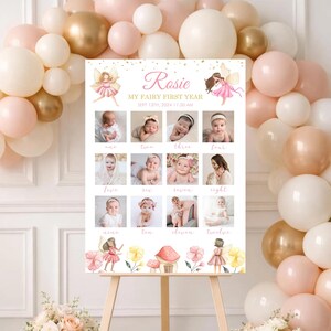 May include: A rectangular white sign titled Rosie My Fairy First Year with twelve square photo slots, fairy illustrations, and mushroom graphics. The text includes the date Sept 13th, 2024, and the time 11:30 AM, with months labeled from one to twelve.