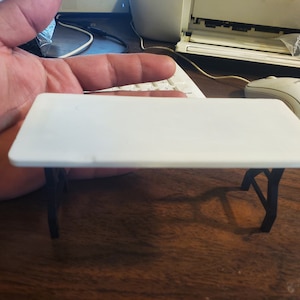 Scale folding table