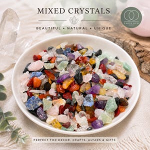 May include: A white bowl filled with a variety of small, tumbled, multi-coloured crystals including shades of purple, red, orange, green, blue, black, and clear white. The text MIXED CRYSTALS, EARTH MUM SYDNEY, and PERFECT FOR DECOR, CRAFTS, ALTARS & GIFTS is visible.