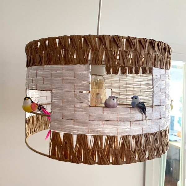 Hanging birdcage in natural raffia, hanging lamp, lighting, atmosphere room, living room, office...