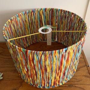 Handmade lampshade or suspension made of natural raffia