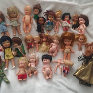 May include: A rustic wooden sign with the text "Welcome to our home" in white lettering. The sign has a distressed finish and a simple, inviting design, ideal for a front porch or entryway.