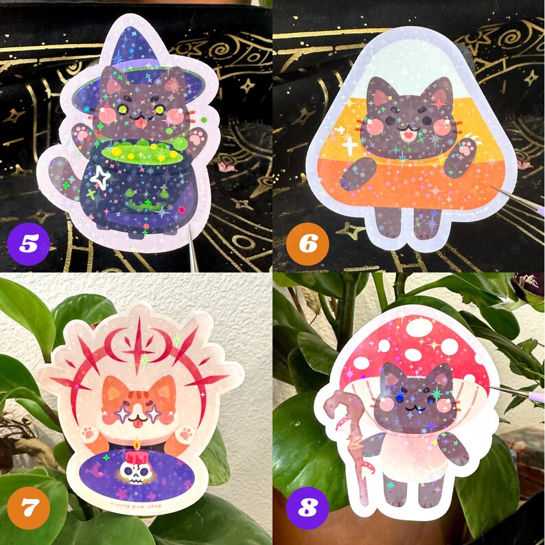 May include: A collection of four holographic stickers featuring cute cartoon cats in various Halloween-themed costumes. One cat is a witch, another is a candy corn, a third is a corgi, and the last is a cat with a mushroom hat.