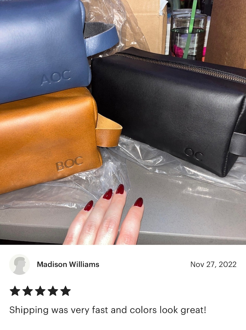 May include: Three leather travel bags in blue, brown, and black with the initials "AOC" and "BOC" embossed on the front.