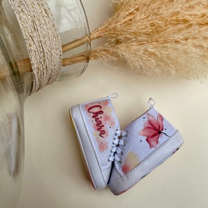 newborn shoe with flower