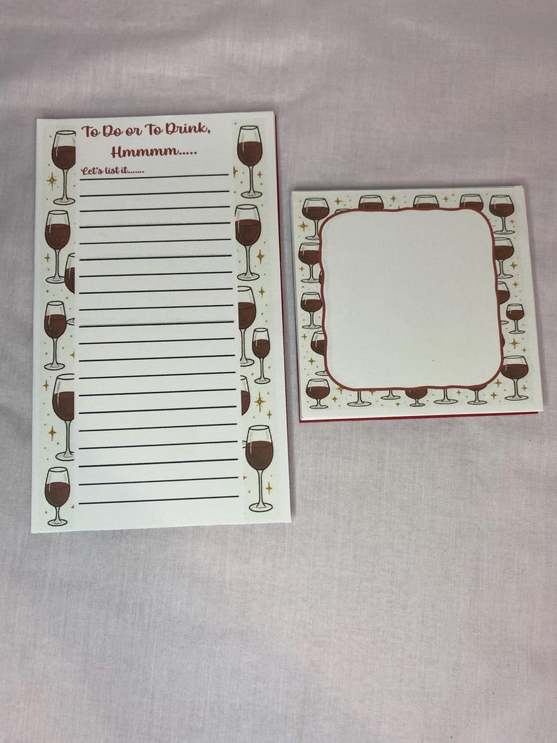 May include: A white notepad and a square memo pad with a wine theme. The notepad has lines for writing and the text "To Do or To Drink, Hmmmm..." and "Let's list it..." The memo pad has a blank space.