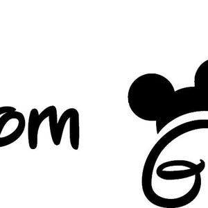 May include: Two black vinyl decals featuring the word Groom in a stylized font. Each word is topped with a silhouette of mouse ears. The design is presented in a clean, bold black color against a plain white background, suitable for application.