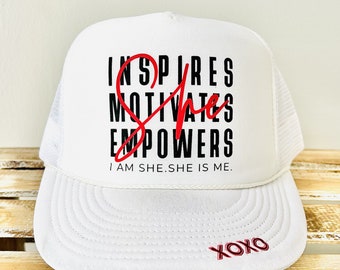 Women's month, SHE Inspires cap, motivation hat, inspires logo, women's logo, motivational logo