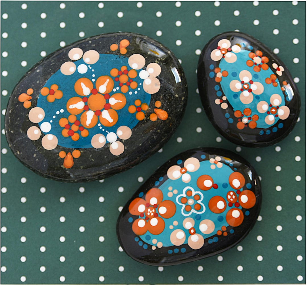 Painted Rocks Floral Patterns Hand-painted Rocks: Striking Floral Dot Patterns on Natural River Rocks ...