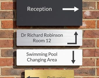 Engraved Directional Sign with Arrow Pictograms, Gold, Silver, Black or White.