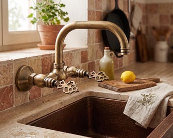 Wall-Mounted Antique Brass Kitchen Faucet: Bridge Type Faucet with Patterned Handle and Swivel Head