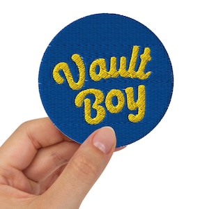 May include: A set of three ceramic mugs with a speckled, matte finish. The mugs are in shades of cream, light gray, and dark gray. Each mug has a simple, minimalist design, perfect for coffee or tea.