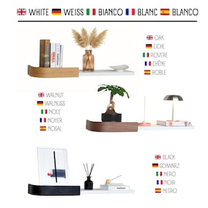 May include: A display of modern floating shelves in white, oak, and walnut finishes, each with decorative items. The shelves showcase books, plants, and a small lamp, with text labels for color and wood type.