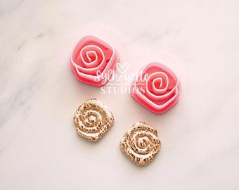 Emporte-pièce en forme de coquillage en spirale en pâte polymère : motif organique en forme de losange sur le thème de l'été