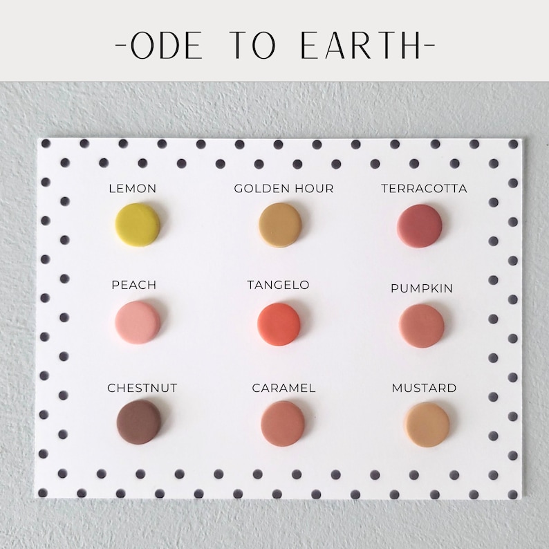 May include: A white card with black polka dots displays nine circular color samples. The colors include Lemon, Golden Hour, Terracotta, Peach, Tangelo, Pumpkin, Chestnut, Caramel, and Mustard. The text "-ODE TO EARTH-" is at the top.