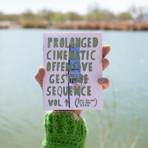 Puede incluir: Un folleto blanco con texto verde que dice "Prolonged Cinematic Offensive Gesture Sequence Vol. 1 (cards for mon to be sung) 2020".