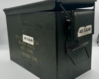 This is a military surplus M200 ammunition can, also known as a “Fat 50”. Made from heavy-duty steel and is water-resistant and airtight.