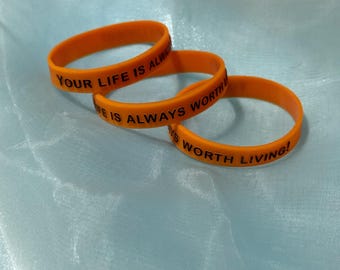 Silikonarmband mit 3-D Aufdruck "Your life is always worth living"