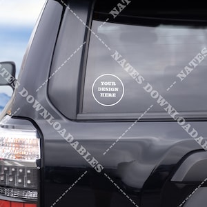 May include: A black SUV with a white circle sticker on the back window. The sticker says "Your Design Here".