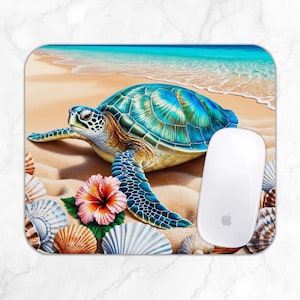 May include: Mousepad featuring a vibrant sea turtle on a sandy beach with seashells and a hibiscus flower. The turtle has a blue and green shell. A white computer mouse is on the right side of the mousepad.