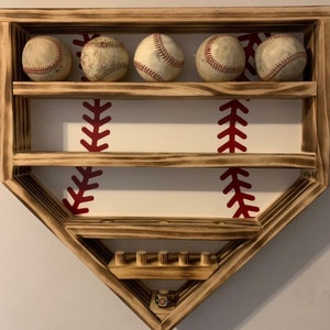 Baseball and Ring Display - Holds 6 Rings/Medals and 18 Baseballs. Rustic finish with traditional red and white baseball backboard