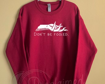 Sudadera cristiana de vinilo blanco con cuello redondo "Don't Be Fooled"