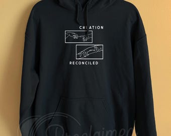 Sudadera con capucha "Creación Reconciliada" / Ropa cristiana inspirada en Miguel Ángel y Romanos