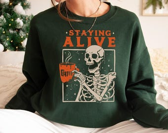 Staying Alive Skeleton Coffee Sweatshirt: Funny Halloween Crewneck Hoodie