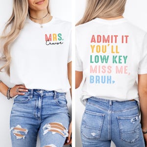a woman wearing a t - shirt that says, admit it you'll low