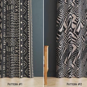 May include: Two black and white patterned curtains with geometric designs. The curtain on the left has a tribal pattern with white dots. The curtain on the right has a zebra-like pattern. The text "PATTERN #1" is below the left curtain and "PATTERN #2" is below the right curtain.