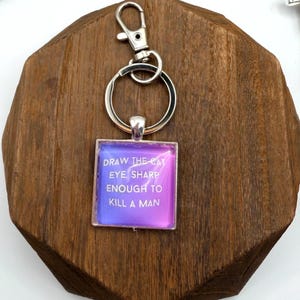 Vigilante Shit Song Lyrics “Draw the Cat Eye Sharp Enough…” Silver Pendant Charm Necklace Keychain  Lyrics Gift for Her Purse Charm