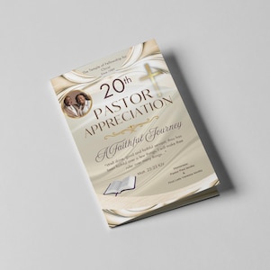 May include: A gold and white program booklet with a photo of a couple in front of a church. The text on the cover reads "20th Pastor Appreciation A Faithful Journey" and includes a Bible verse: "Well done, good and faithful servant, thou has been faithful over a few things, I will make thee ruler over many things." Matt. 25:23 KJV. The program also lists the honorees: Pastor Paul Jacoby and First Lady Vanessa Jacoby.