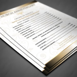 May include: A stack of white event programs with gold borders and decorative floral accents. The text reads "Church Anniversary" and "Order of Service." The program includes sections for the master of ceremonies, worship service, prelude, and more.