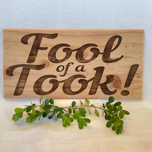 Fool of a Took Sign (~10" x 5.5" x .5" Cedar Wood)