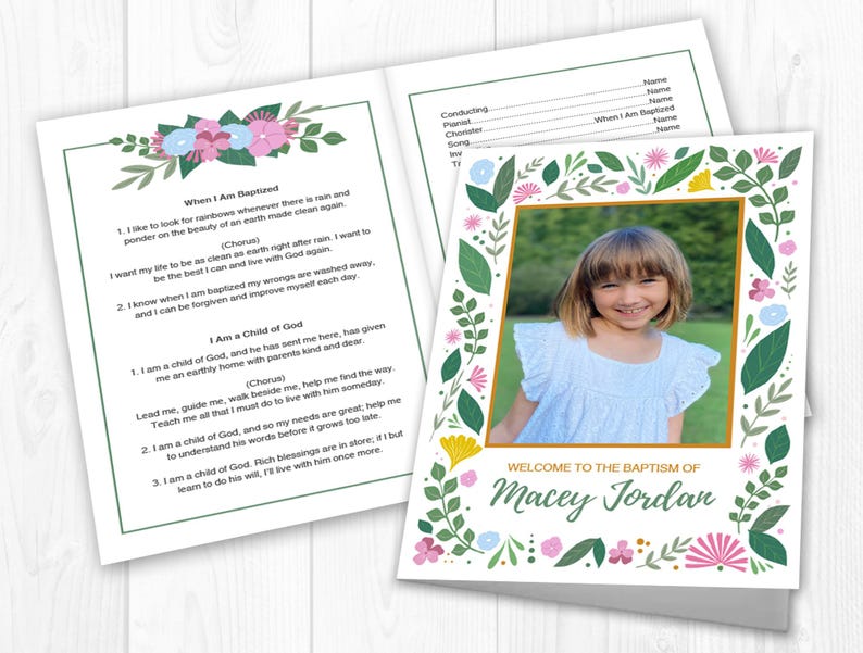 May include: A baptism invitation featuring a photo of a smiling child framed by a floral border. The text "Welcome to the Baptism of Macey Jordan" is displayed below the photo. The open invitation also includes a poem with floral accents.