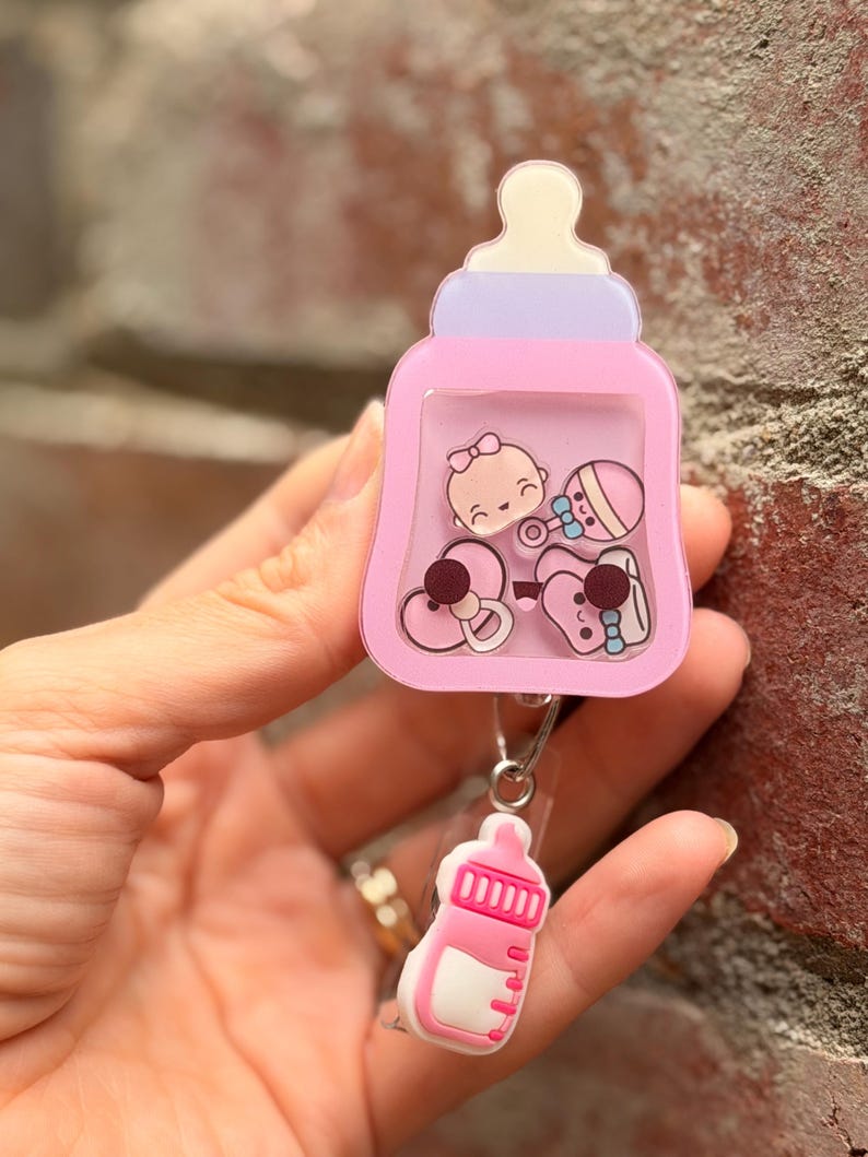 3D Floating Emoji Badge Reel: Medical ID Clip for Nurse, Doctor, Midwife, Student 7. Baby Bottle