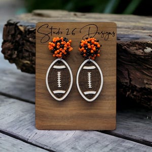 Game Day Orange and Black Wooden Football Pom Pom Earrings | Hand Painted | Team Spirit | Team Colors Earrings