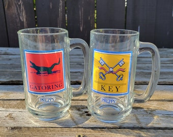 Vintage "The Official Preppy" Drinking Mugs by Tastesetter, Set of 2, "Key" and "Gatoring" Glass Tankards, 1980s Memorabilia, Collectible