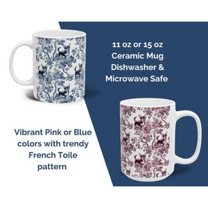 May include: Two ceramic mugs with a French Toile pattern featuring a black and white silhouette of a dog. The mug on the left is blue and white, and the mug on the right is pink and white. The mugs are 11 oz or 15 oz and are dishwasher and microwave safe.