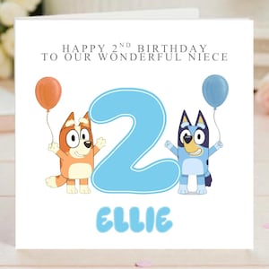 May include: A birthday card with the text "HAPPY 2ND BIRTHDAY TO OUR WONDERFUL NIECE" and the name "ELLIE". The card features cartoon characters holding balloons and a large number "2" in light blue.