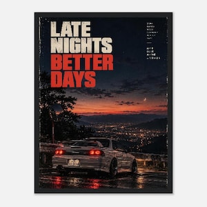 May include: A framed poster featuring a white sports car parked on a mountain road overlooking a city at dusk. The text LATE NIGHTS BETTER DAYS is printed in large white and red letters. The scene includes a crescent moon and Japanese text.