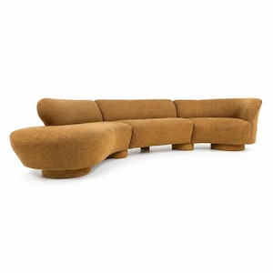 May include: A modern, modular sofa in a warm, golden-brown color. The curved design features a rounded ottoman and several seating sections, all with a textured fabric. The sofa sits on short, sturdy legs, offering a stylish and comfortable seating option.