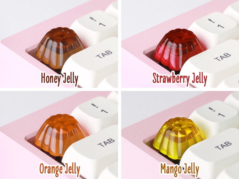 May include: Four different colored jelly keycaps for a keyboard. The keycaps are shaped like a dome and have a rippled texture. The colors are honey, strawberry, orange, and mango.