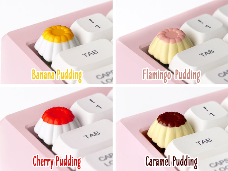 May include: Four different pudding-shaped keycaps for a keyboard. The keycaps are white with a yellow, pink, red, and brown pudding topping. The keycaps are labeled "Banana Pudding", "Flamingo Pudding", "Cherry Pudding", and "Caramel Pudding".