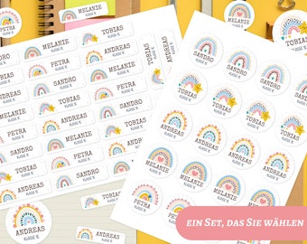 May include: A collection of rectangular and circular adhesive labels featuring a colorful rainbow graphic, a yellow star, and the printed names Melanie, Petra, Sandro, Tobias, and Andreas, each accompanied by the text KLASSE 1E.