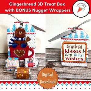 Könnte beinhalten: Ein digitaler Download mit einer Lebkuchen-3D-Geschenkbox und Nugget-Verpackungen. Das Box-Design zeigt einen Lebkuchenmann in einer Tasse, und die Verpackungen tragen die Aufschrift "Gingerbread kisses & Warm Winter wishes". Das Design hat ein rot-weiß-blaues Farbschema.