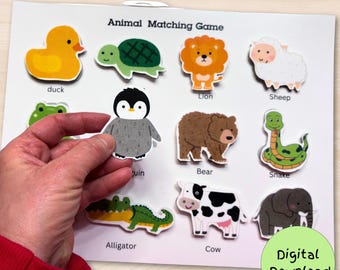 May include: A printable animal matching game with colorful illustrations of animals like a duck, lion, sheep, penguin, bear, snake, alligator, cow, and elephant. The game is designed for children to learn animal names and match the pictures.