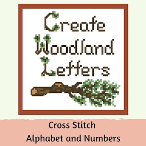 May include: A brown frame with the text "Create Woodland Letters" in brown letters with green leaves. A brown branch with green leaves is below the text. The text "Cross Stitch Alphabet and Numbers" is below the frame.