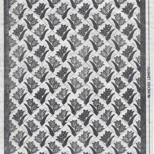 May include: Black and white illustration of a quilt pattern with a tulip design. The quilt is 52 inches wide for a single bed and 74 inches wide for a double bed. The quilt is 96 inches long.